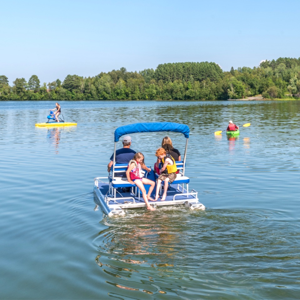 A family enjoys water sports on Shagawa Lake