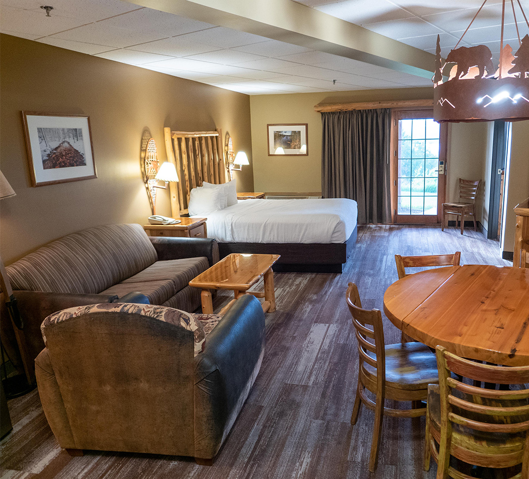 Main living area in the 2 room suite at Grand Ely Lodge.